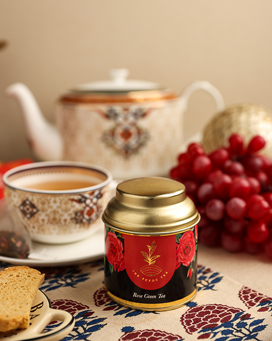 Pekoe Rose Tea in a container in the foreground